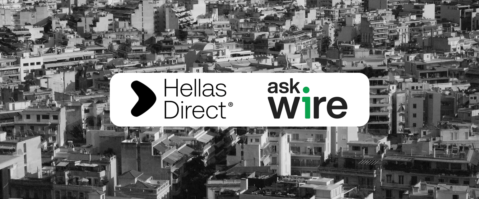 Φόντο ασπρόμαυρο, πόλη από ψηλά, στη μέση της εικόνας λευκό πλαίσιο με λογότυπα Hellas Direct και Ask wire